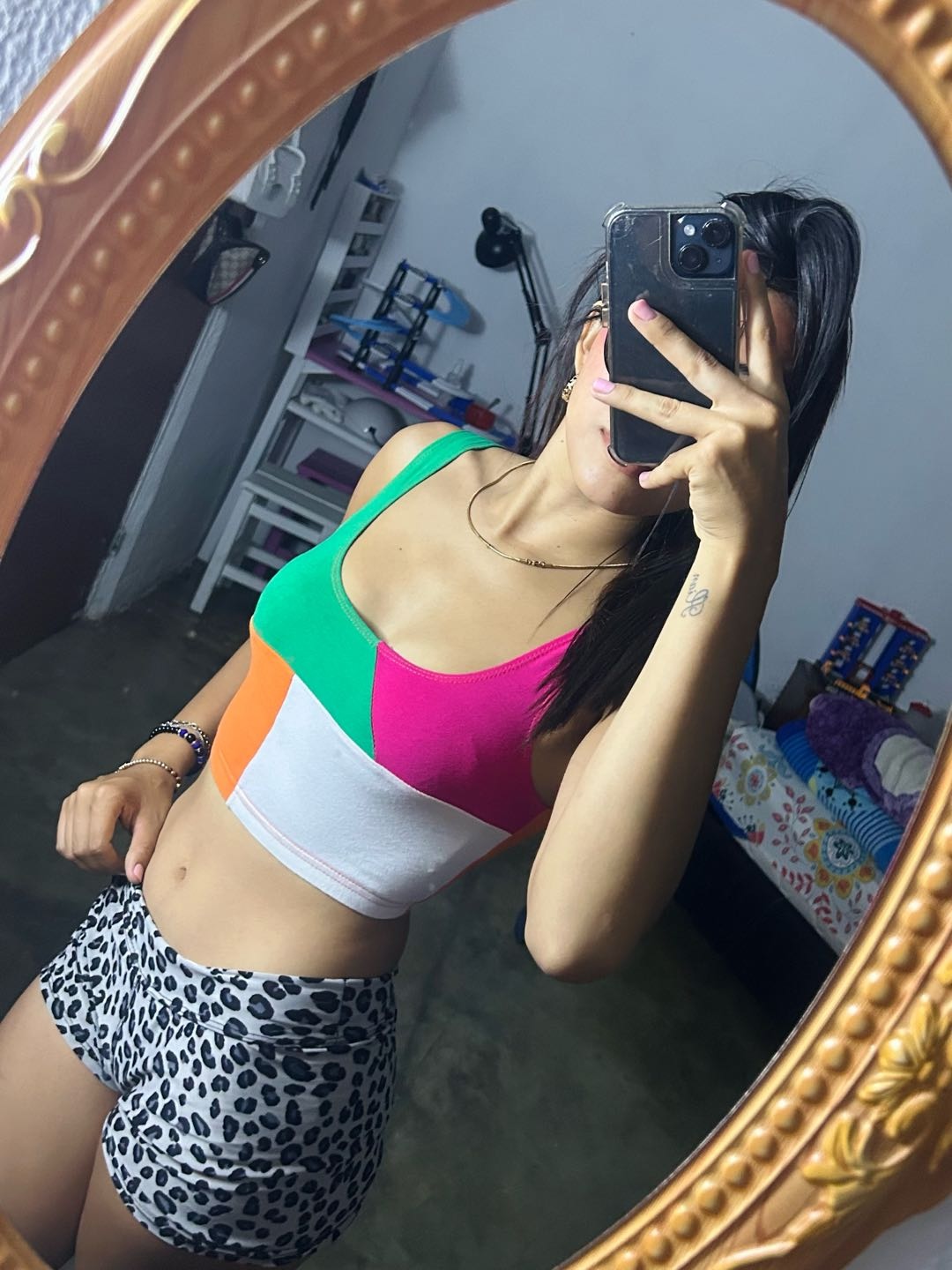 A woman from Venezuela taking a mirror selfie before a random chat